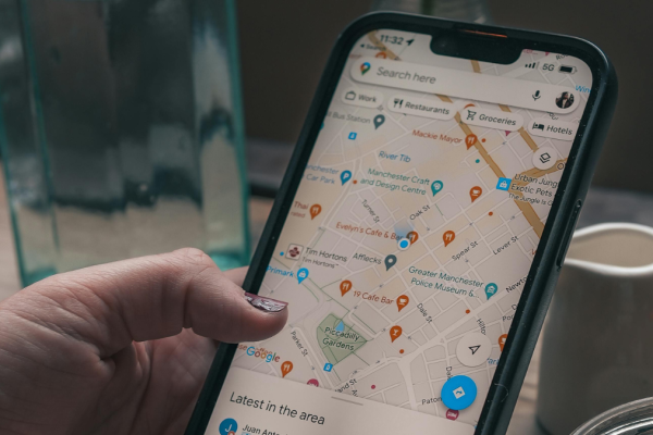Google Maps local search results on a smartphone showing nearby businesses and map listings for local SEO